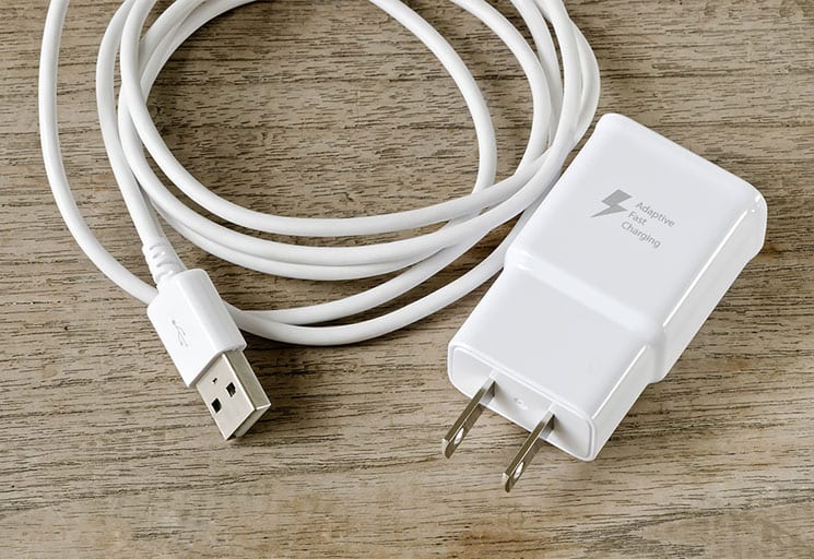 Tangled iPhone charger and adapter